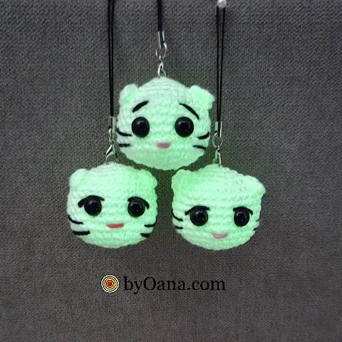 Cat keychains glow in the dark